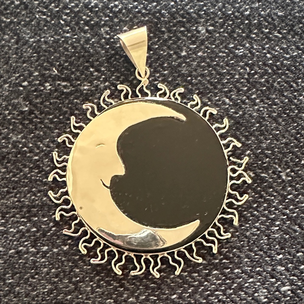Celestial Sun and Moon Pendant in silver and Black
Silver 925